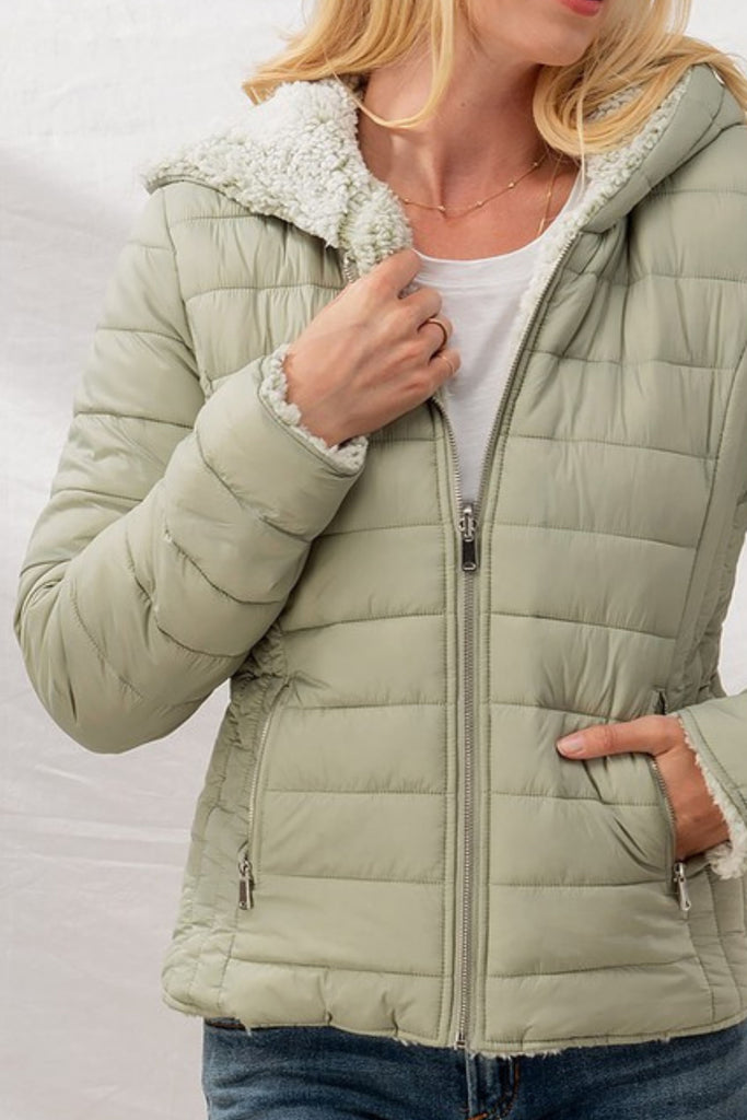 shoppers say this reversible puffer jacket is an affordable